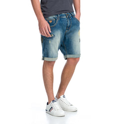 Men's distressed stretch denim shorts in medium blue - Koroshi 1911PS56