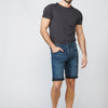 Men's tapered fit denim shorts with five pockets and worn effect