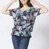 Blouse fluide à manches courtes avec imprimé tropical | style polyvalent