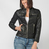 Chaqueta Cazadora de Mujer efecto piel con bolsillo delanteros y Detalles Bordados en los Hombros, laterales y puños
