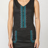 Short fitted sleeveless strap dress with ethnic details and round neckline | Versatile style