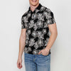 Polo homme en coton à manches courtes, finition côtelée et col chemise boutonné à imprimé tropical | Vêtements décontractés
