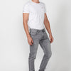 Slim fit long pants with five pockets, one ticket pocket and front zipper and button closure for Men