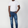 Long skinny fit biker pants with front zipper and button closure and details on the knees for Men