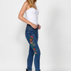 Long slim fit push up pants with embroidered details and front closure with zipper and dark button | Current trend