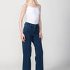 Long flared denim pants with front seam and front zipper and button closure by | Daily look