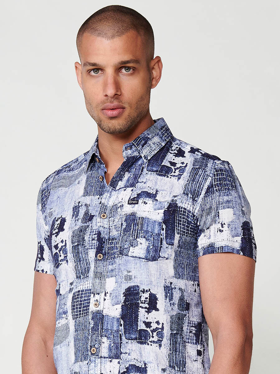 Chemise à manches courtes multicolore à imprimé tropical pour homme