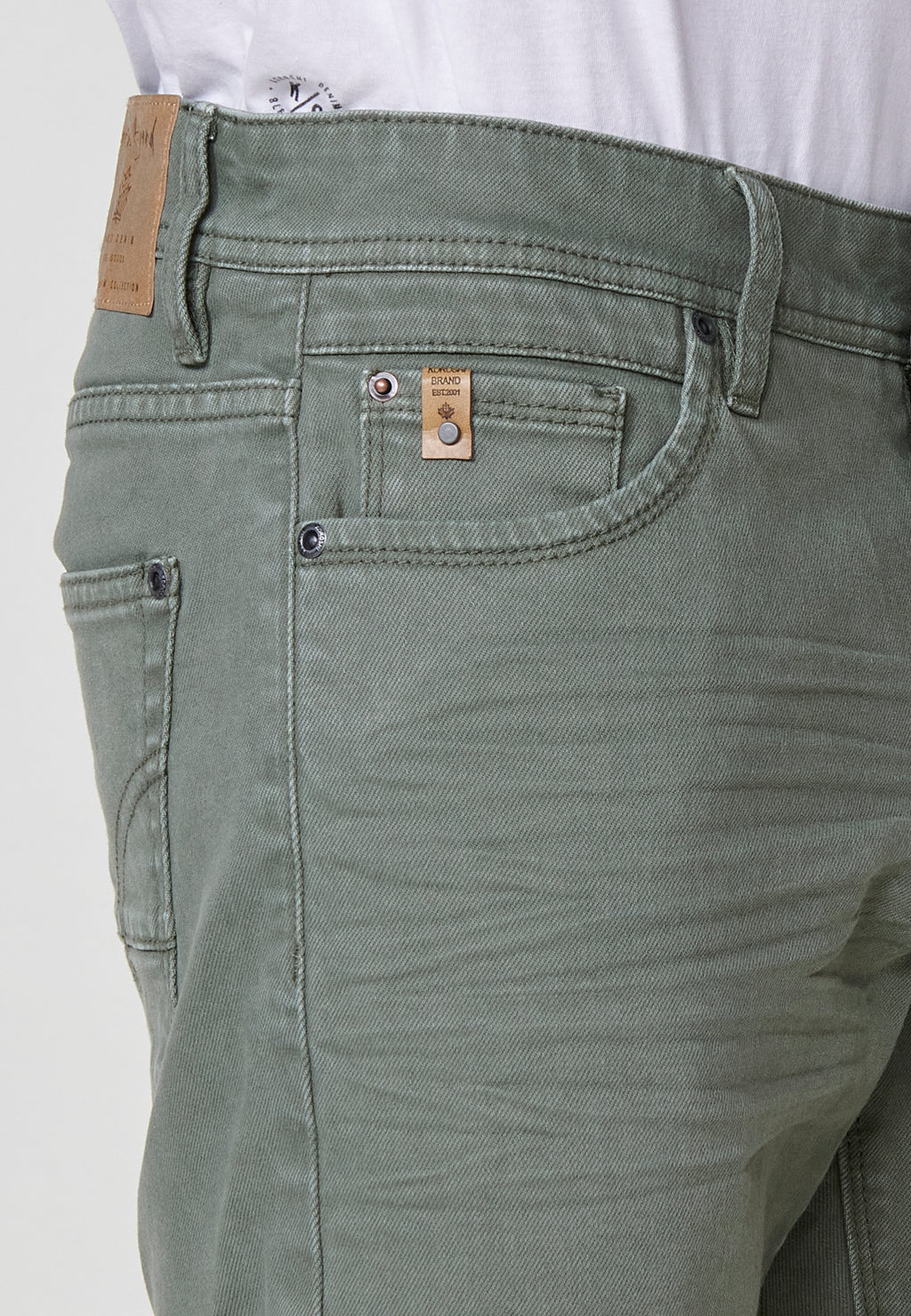 Regular fit Bermuda shorts with front zip and button closure, five pockets, one ticket pocket, and unfastened turn-up hems for men by .