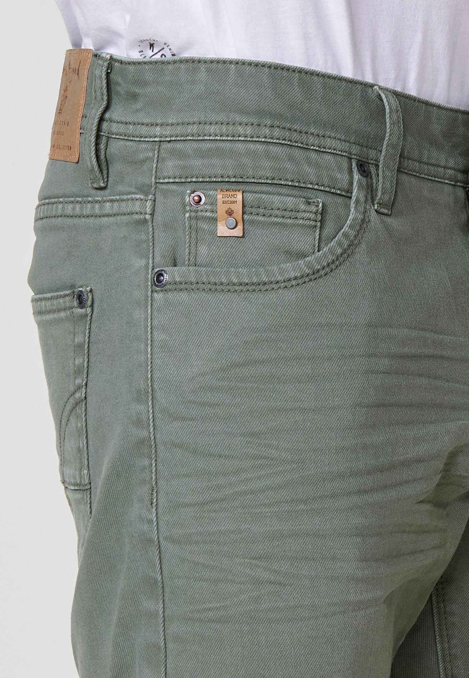 Regular fit Bermuda shorts with front zip and button closure, five pockets, one ticket pocket, and unfastened turn-up hems for men by .