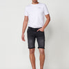 Regular fit denim shorts with front zip and button closure, five pockets with a worn effect and unfastened cuffed hems for men in black denim