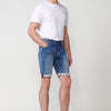 Men's regular fit denim shorts with zip and button front closure, five worn-effect pockets and unfastened cuffed hems