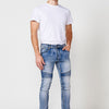 Long skinny fit Biker denim pants with pockets with details on the knees for Men