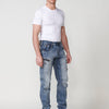 Long workwear cargo jeans, regular fit, stretch denim style with worn washed effect and cuts and pockets on the leg with front closure with zipper and button for Men