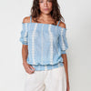 Women's off-the-shoulder blouse with honeycomb gathering at the neckline, waistband and cuffs with embroidery and adjustable removable straps