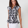 Short-sleeved blouse, mandarin collar, ruffles on the sleeves and hem, front button closure and black abstract print