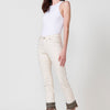 Slim, mid-rise, five-pocket cropped push-up stretch jeans with zipper closure and metal button and embroidered detail with sequins and fringes with beads and wooden balls at the hem for women