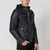 Men's biker style jacket in blue with detachable hood and zipper closure. 100% cotton exterior with polyurethane coating.