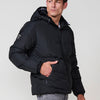 Chaqueta cazadora acolchada tipo parka hombre cuello alto, capucha, bolsillos y cremallera.