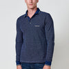 Polo homme bleu marine à manches longues, 100% coton, doté d'un col chemise, d'une ouverture boutonnée et d'un style polyvalent.