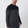 Men's ecru tricot sweater with round neck and long sleeves. 100% acrylic construction, comfortable, light and timeless.