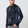 Pull homme en tricot chiné noir à col rond et manches longues. Tissu mélangé de coton et de polyester, confortable et moderne.