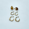 Set de tres pendientes tipo aro dorados y efecto carey para mujer