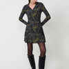 Short floral dress for women with V-neckline and metal zipper with hoop. Long sleeve, elastic fabric and Koröshi logo.