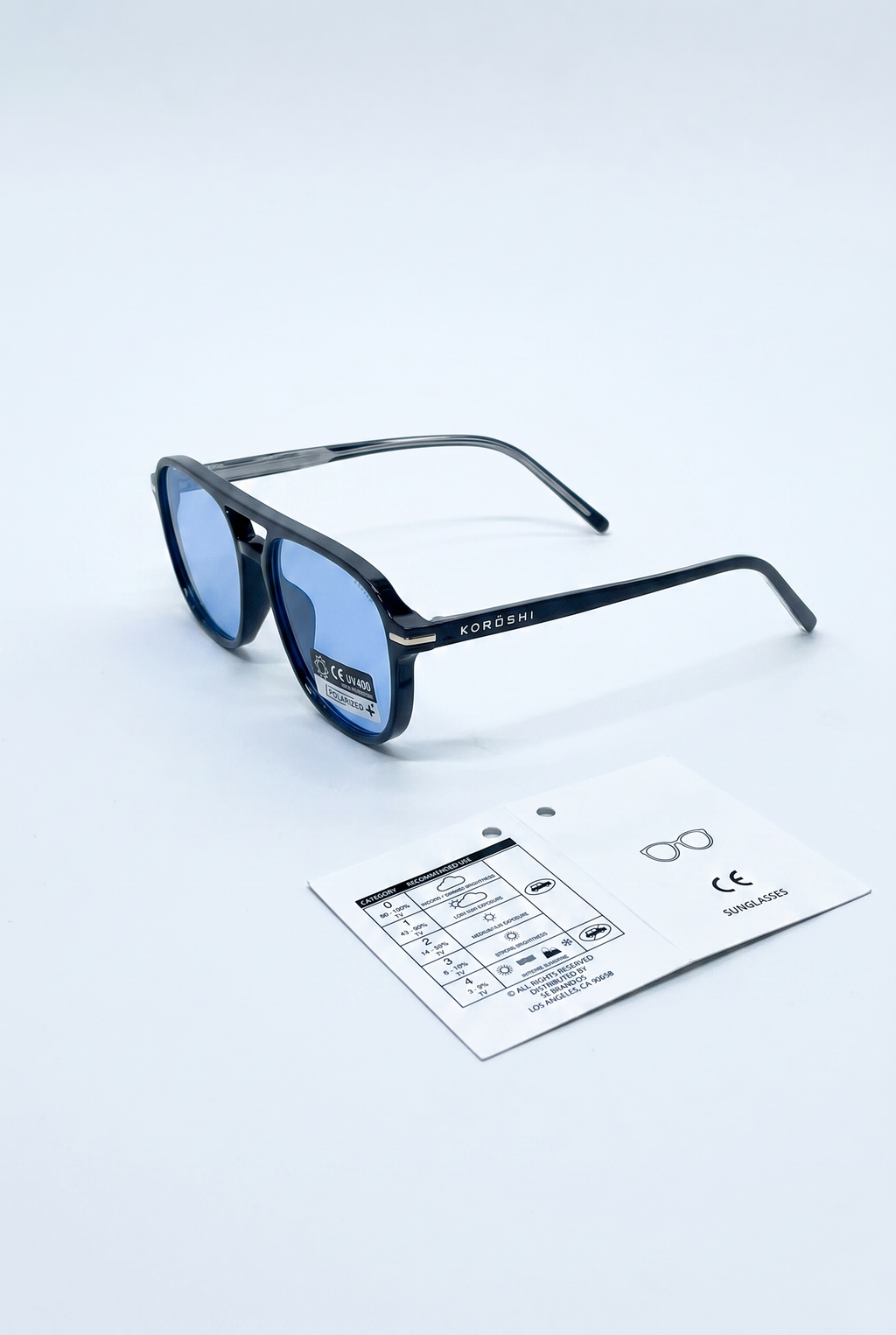 Lunettes de soleil unisexes noires avec verres bleus