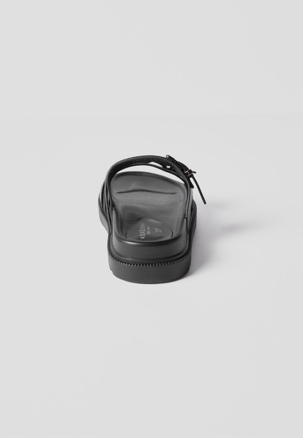 Sandale plate effet cuir noir