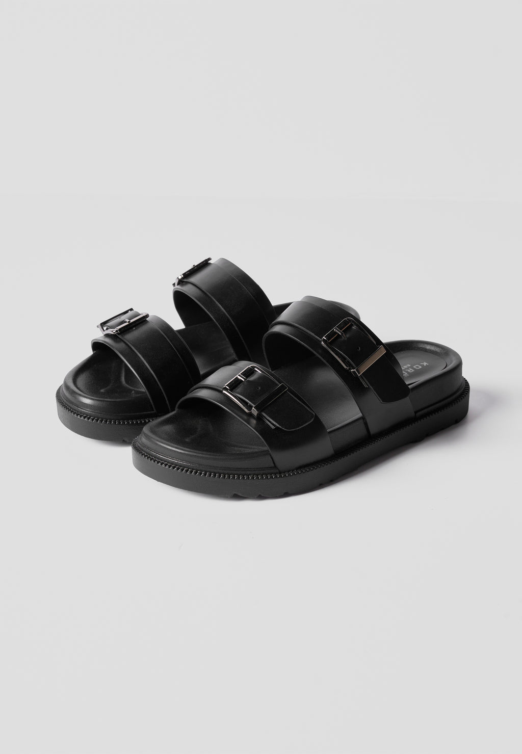 Sandale plate effet cuir noir