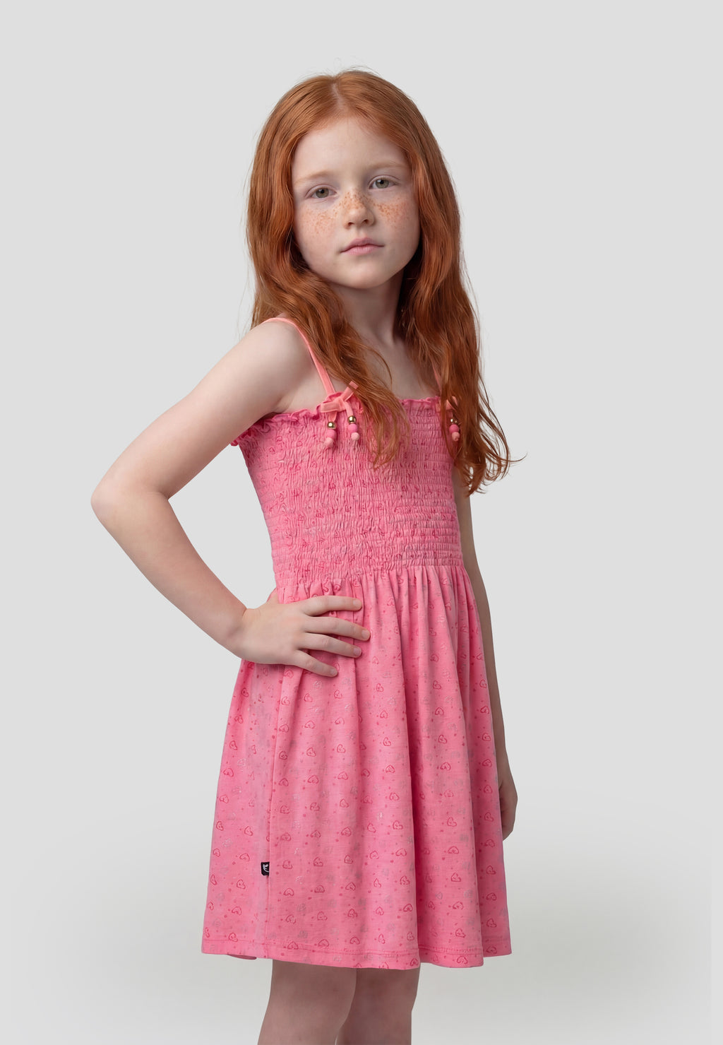 Fuchsiafarbenes Mädchenkleid mit Schleifenträgern