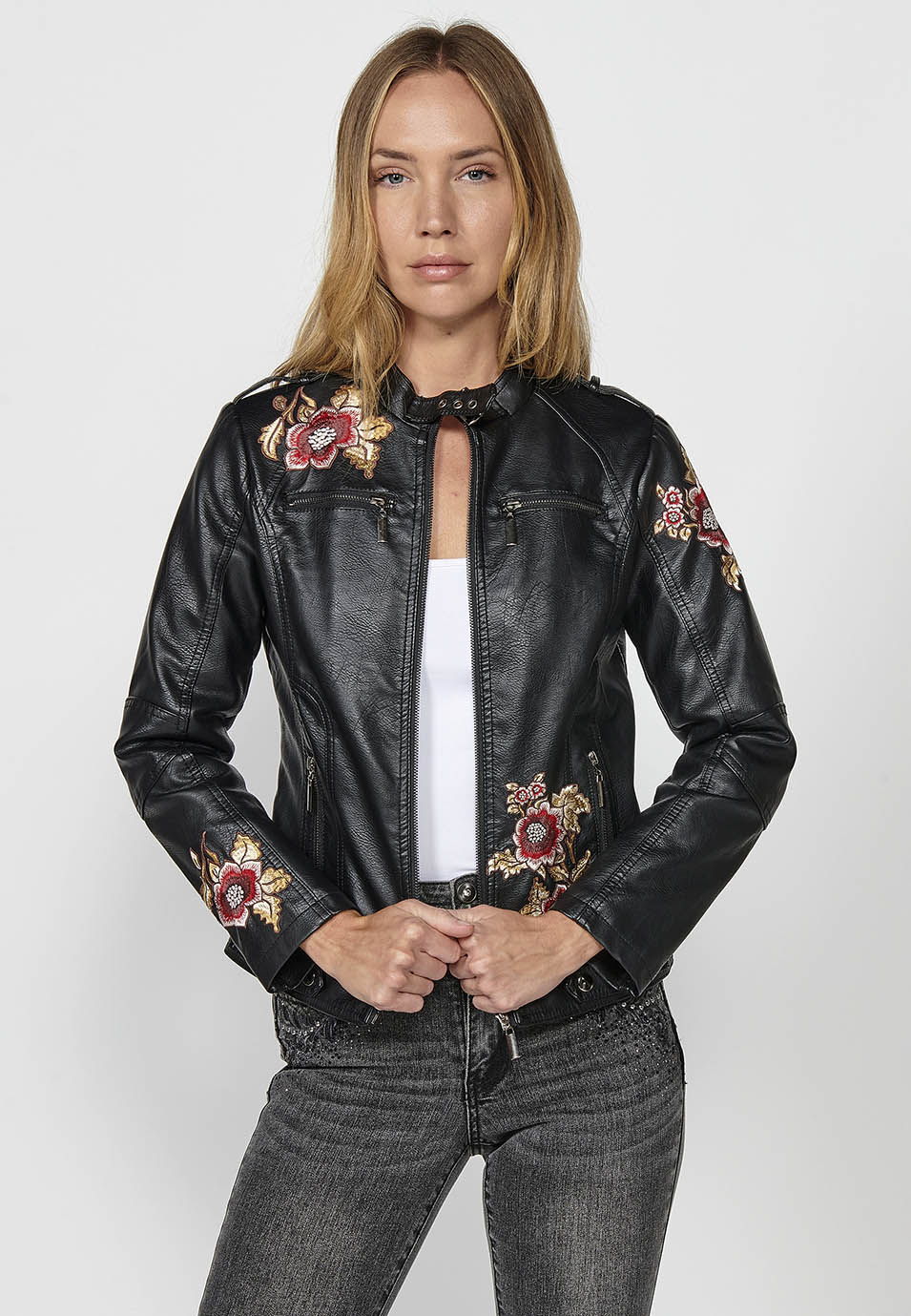 Faux leather jacket with embroidered floral details and front zip closure for women in black