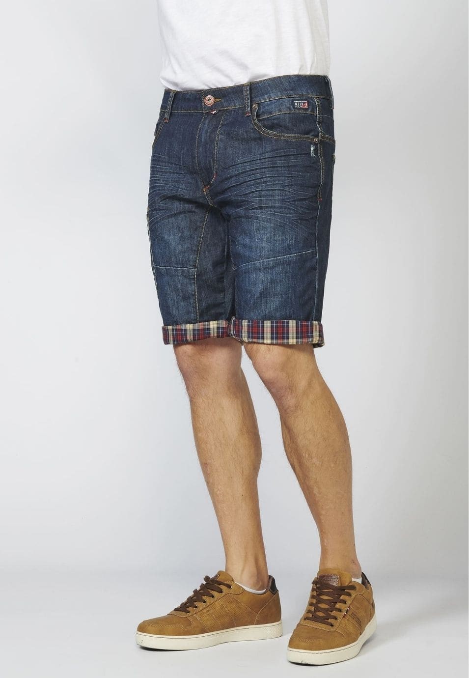 Pantalón corto denim cortes regular fit con siete bolsillos y efecto desgastado 100% algodón para Hombre