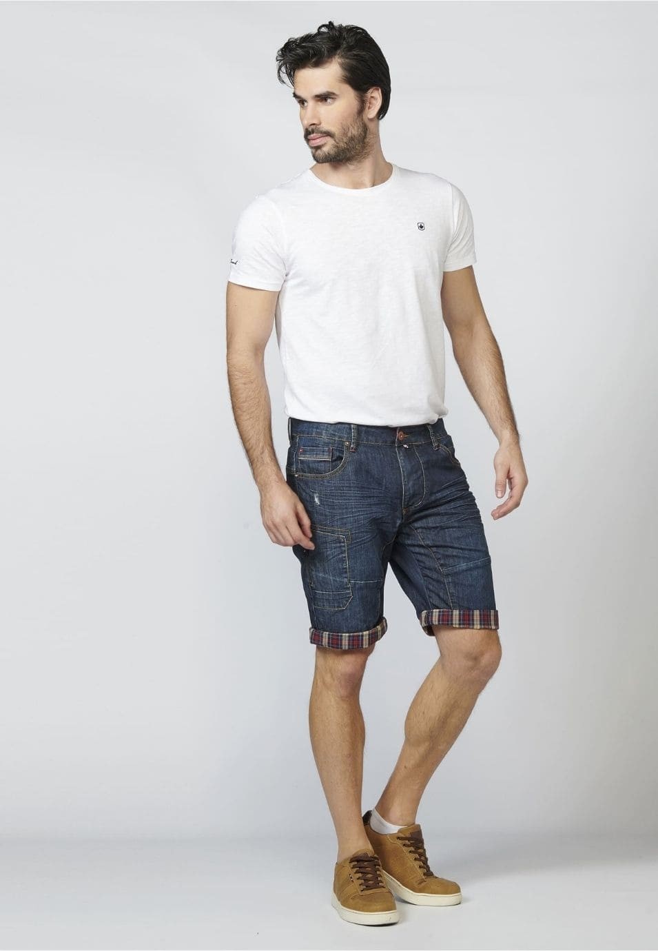 Pantalón corto denim cortes regular fit con siete bolsillos y efecto desgastado 100% algodón para Hombre 1