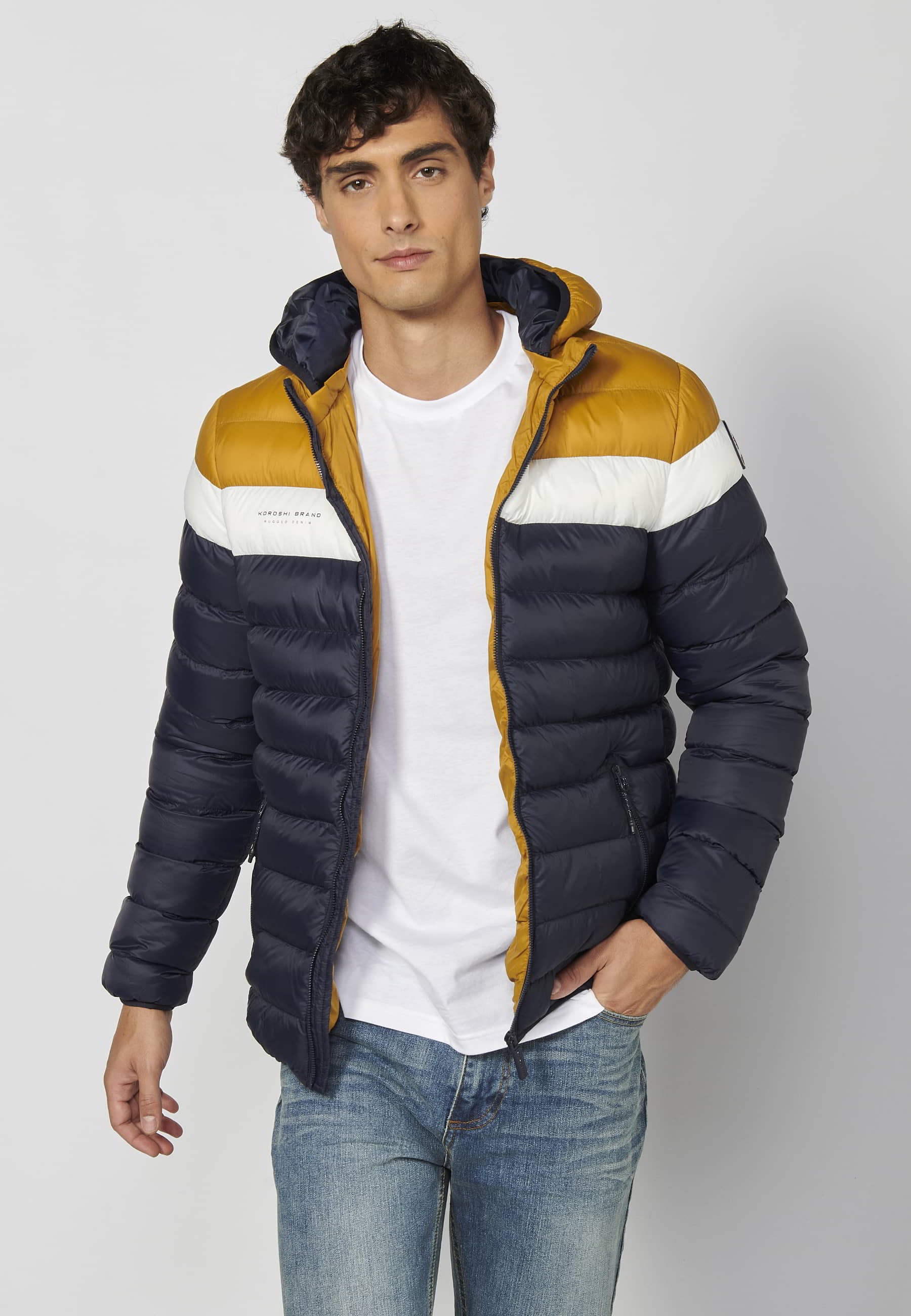 Short padded jacket with high collar with hood in Blue for Men