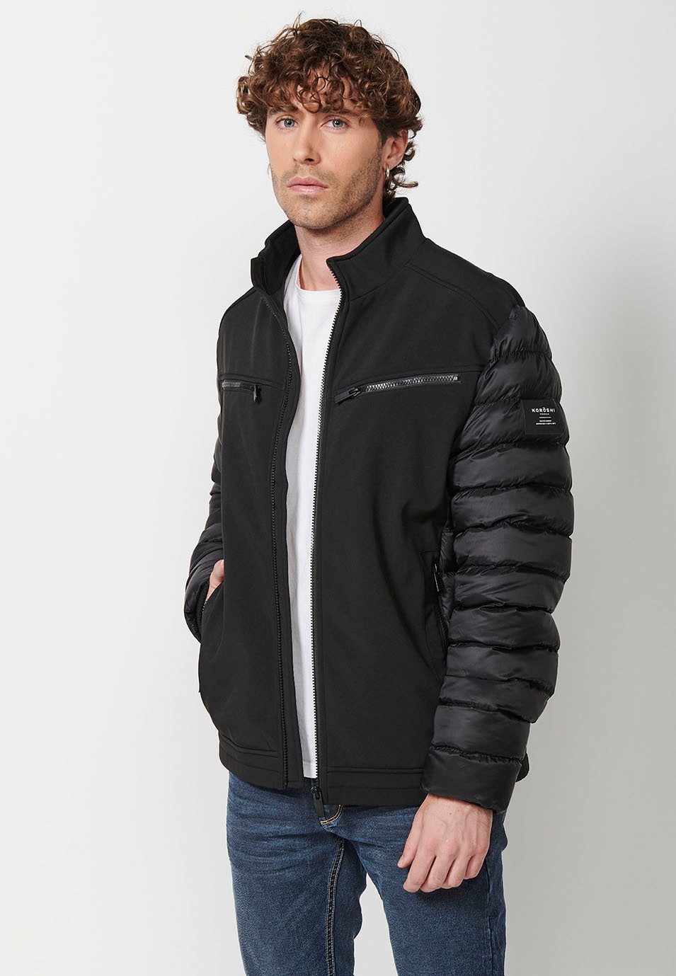 Mens Quilted Bomber Jacket with Stand Collar and Front Zip Closure and Pockets in Black