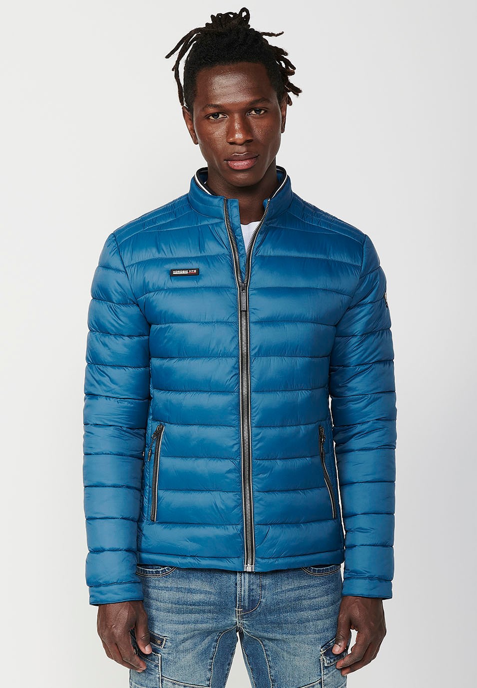 Mens Quilted Jacket with Stand Collar and Front Zip Closure in Blue