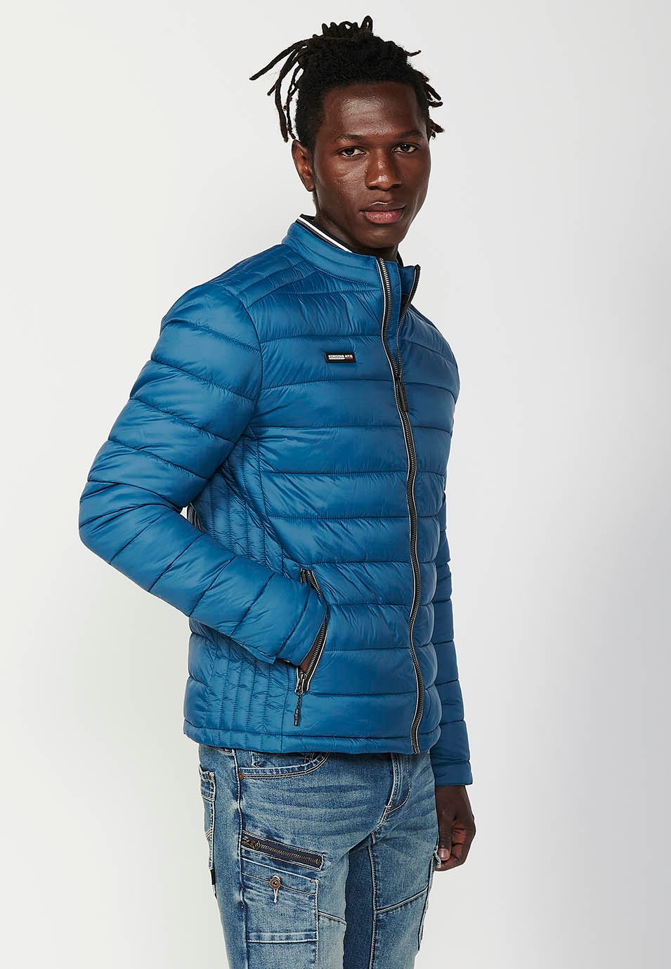 Mens Quilted Jacket with Stand Collar and Front Zip Closure in Blue 1