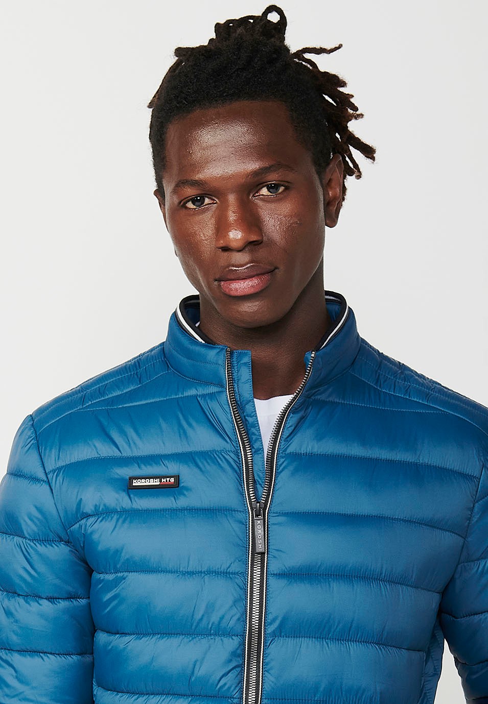 Mens Quilted Jacket with Stand Collar and Front Zip Closure in Blue 2