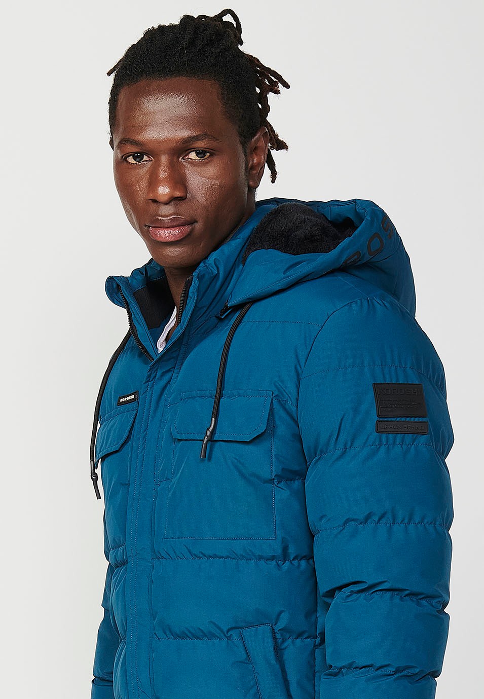 Mens Quilted Jacket with Hooded Collar and Front Zip Closure and Pockets in Blue 4