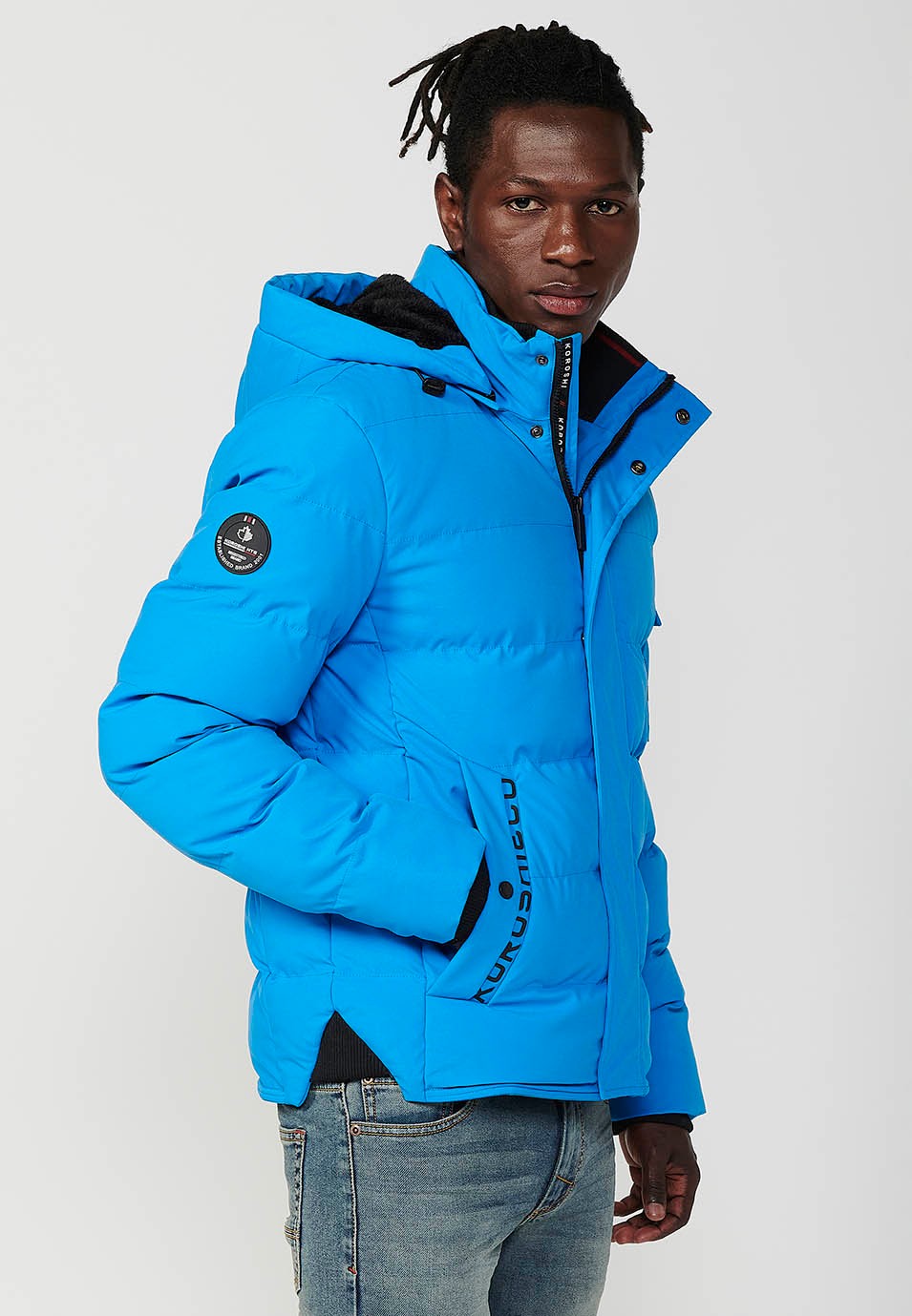 Veste matelassée bleue pour homme avec col et capuche avec fermeture frontale et fermeture éclair avec poches