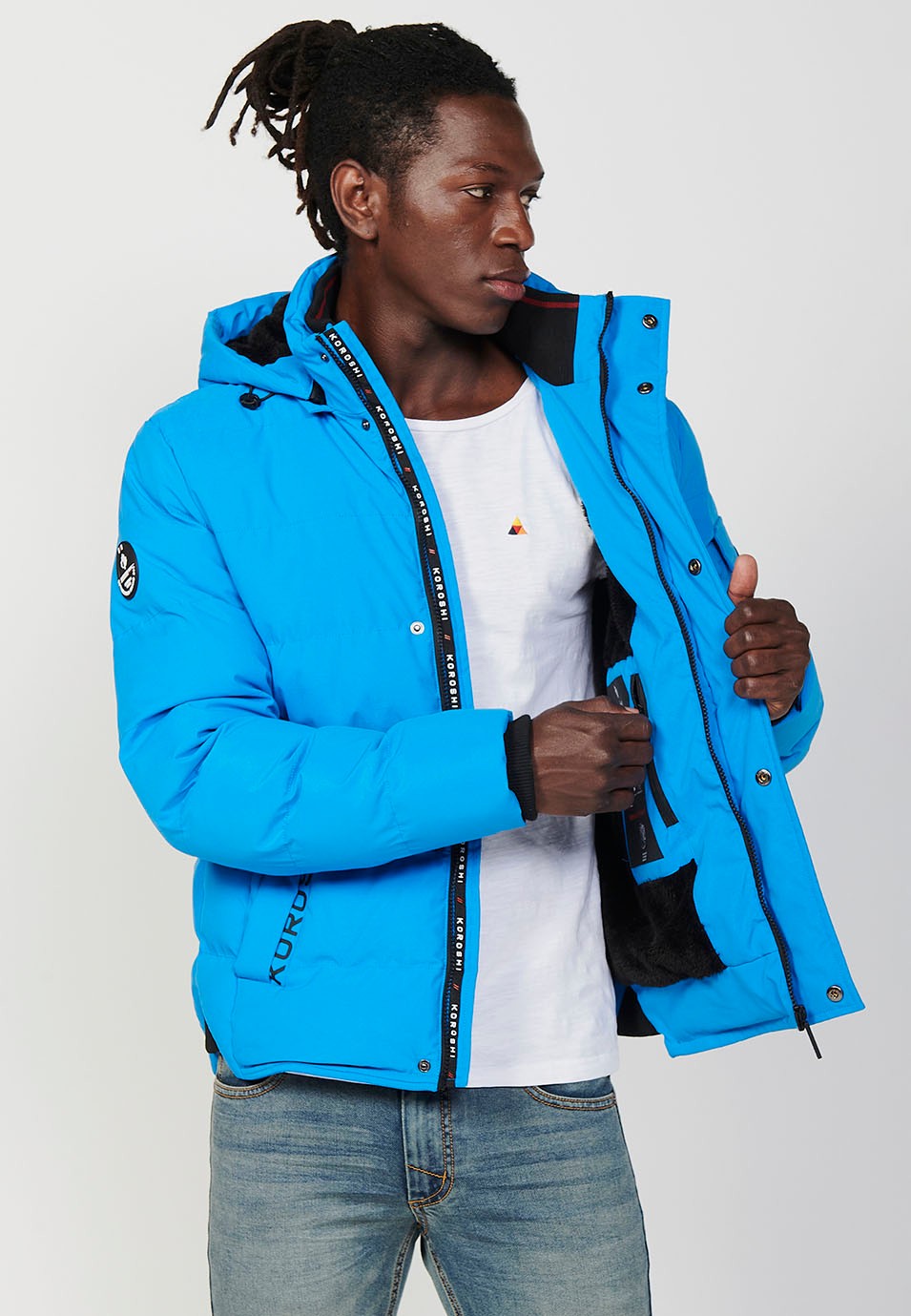 Veste matelassée bleue pour homme avec col et capuche avec fermeture frontale et fermeture éclair avec poches