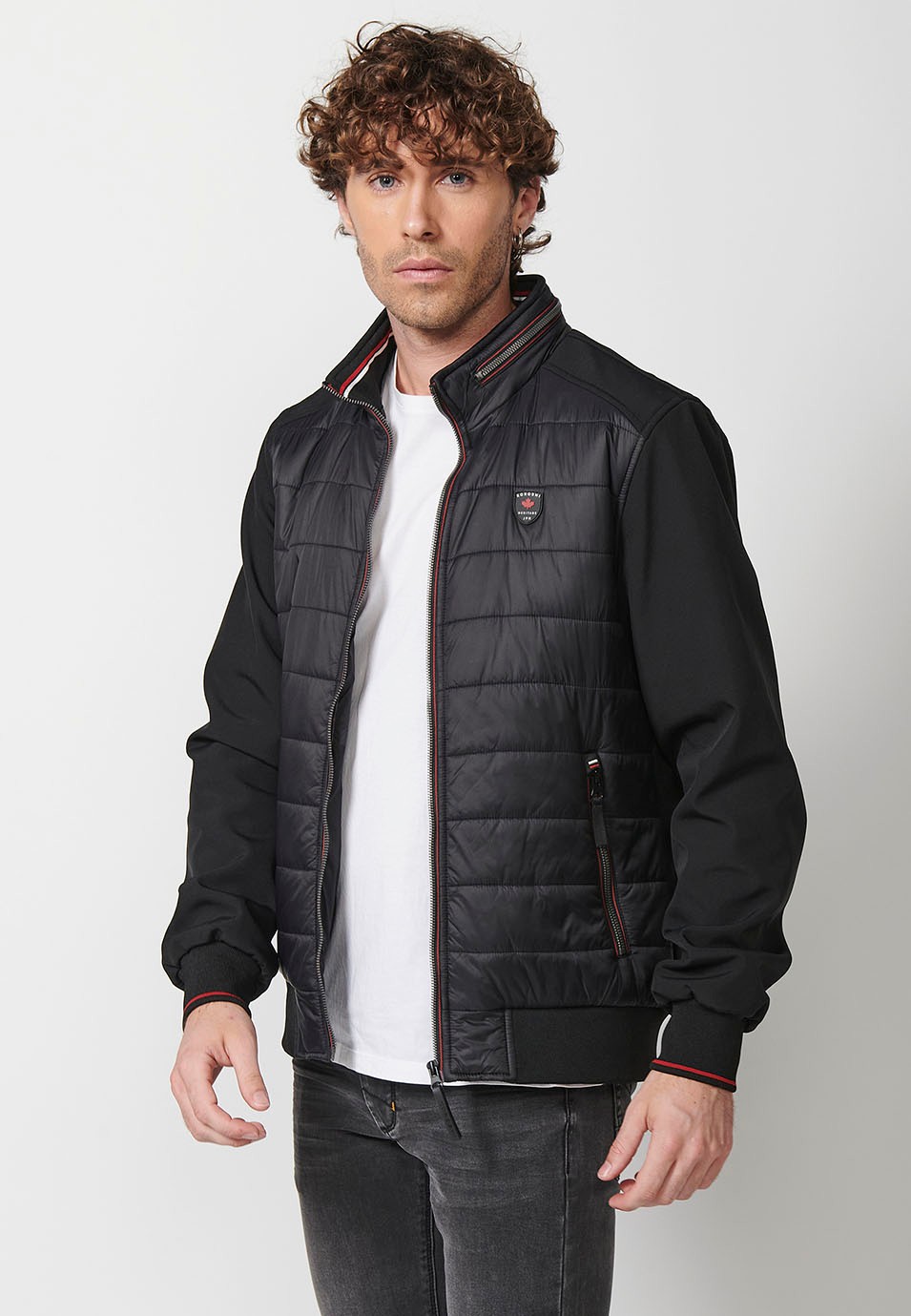 Chaqueta Cazadora acolchada de cuello alto con relleno con Cierre delantero con cremallera y Acabados en rib con Bolsillos con cremalleras color Negro para Hombre