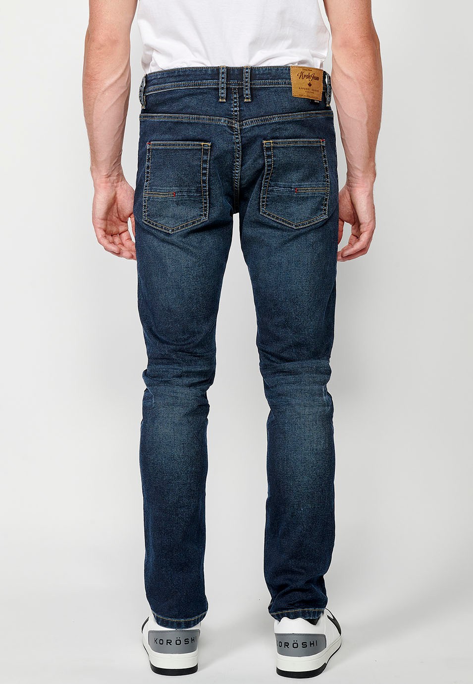 Pantalon long slim fit en jean avec fermeture zippée et boutonnée sur le devant en Bleu pour Homme