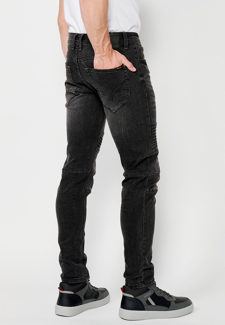 Pantalon long en denim style motard coupe skinny avec fermeture sur le devant avec fermeture éclair et bouton et détails sur les genoux en Noir pour Homme