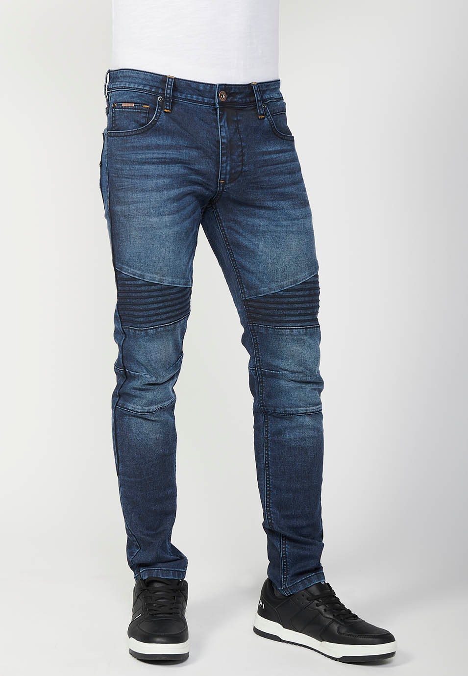 Pantalon motard long coupe skinny avec fermeture éclair et bouton sur le devant et détails sur les genoux en Bleu pour Homme