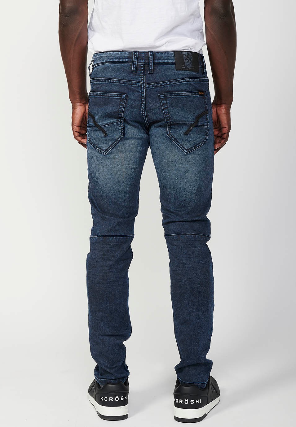 Pantalon motard long coupe skinny avec fermeture éclair et bouton sur le devant et détails sur les genoux en Bleu pour Homme