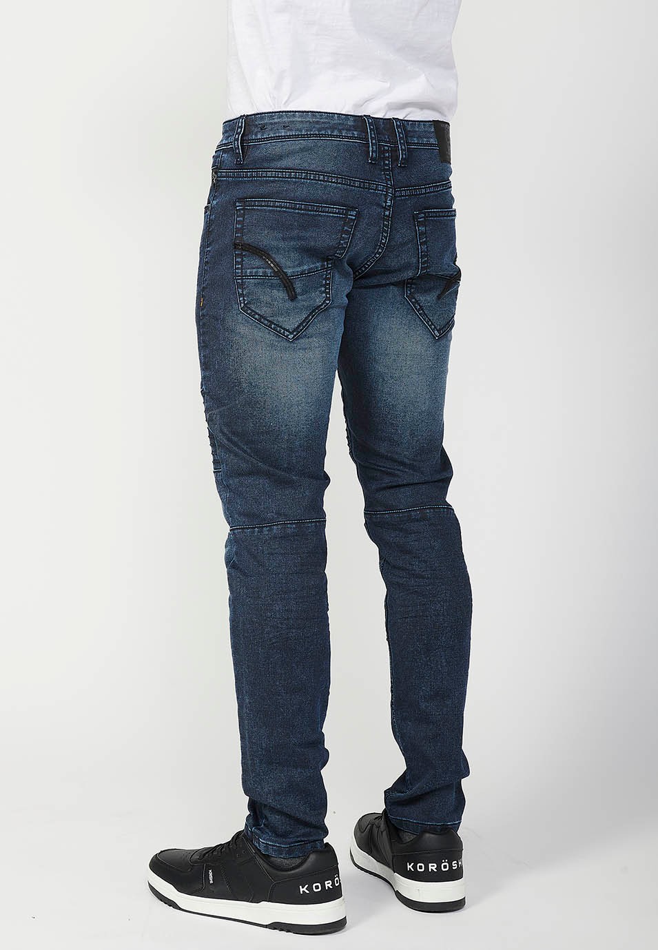 Pantalon motard long coupe skinny avec fermeture éclair et bouton sur le devant et détails sur les genoux en Bleu pour Homme