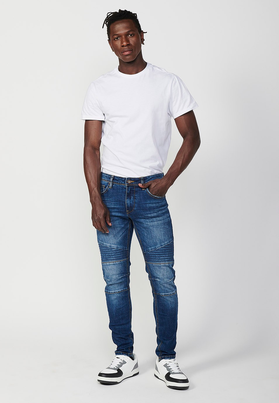 Pantalon motard long coupe skinny avec fermeture éclair et bouton sur le devant et détails sur les genoux en Bleu pour Homme