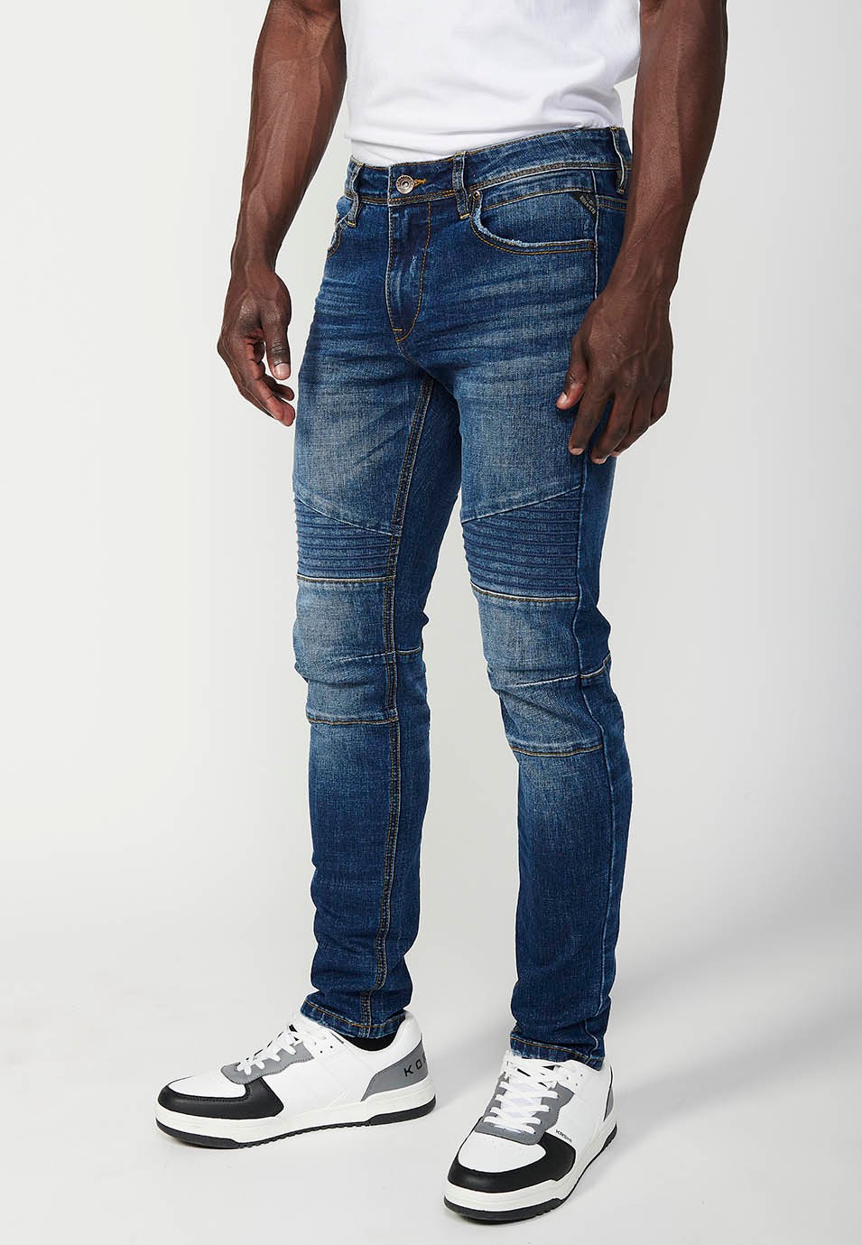 Pantalon motard long coupe skinny avec fermeture éclair et bouton sur le devant et détails sur les genoux en Bleu pour Homme